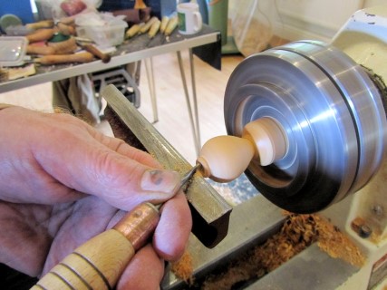 Showing the use of one of his many home made mini tools